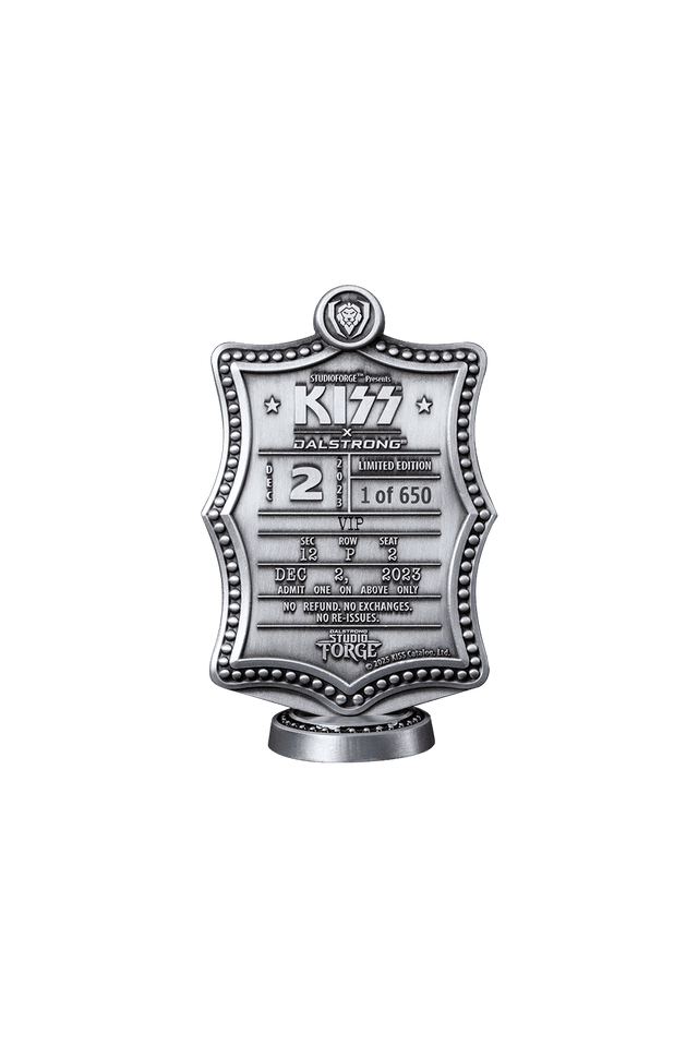 The badge, numbered