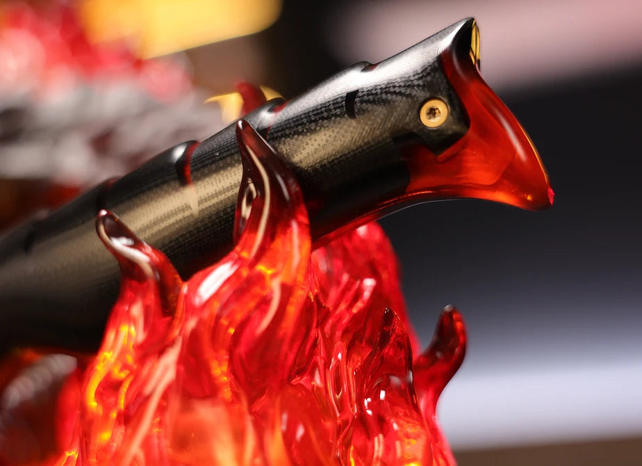 <h4>Warm, slow, alive.</h4><p>Integrated 2700K light breathes through the flame field, the eyes, and the open throat, swelling and fading like real fire — not a strip that blinks.</p>