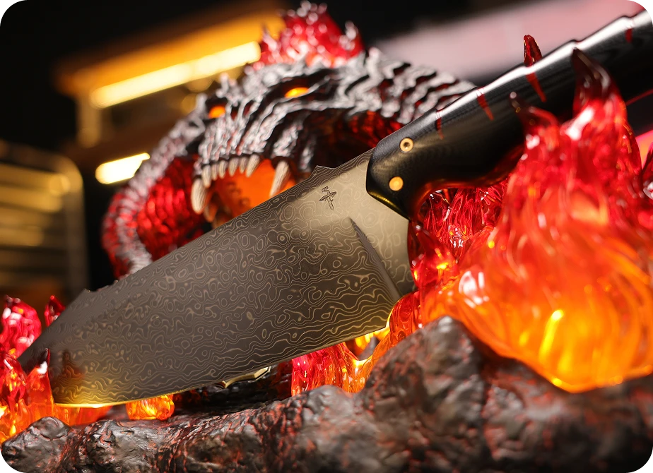 <h4>Every surface draws the eye.</h4><p>A broad, faceted chef’s knife profile with a raised, reverse-swept tip and a sculpted heel — drawn to look like a relic that could have come up out of Moria itself. Not based on an existing form factor, but crafted from scratch.</p>